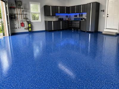 Blue chip floor laid wall to wall in a Sarnia garage
