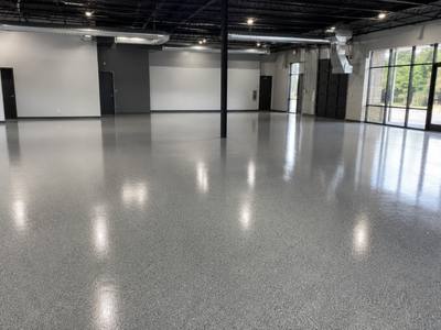 Flake floor across the open floor of a commercial unit