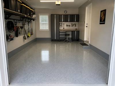 Single bay garage floor coated wall to wall in a Lambton County home