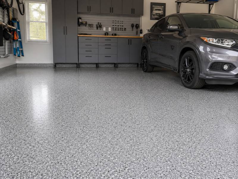 Coated garage floor back in daily use with a vehicle parked on it